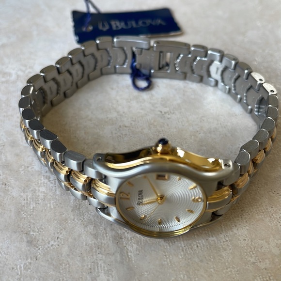 COPY - Bulova lady battery water resistant 30m silver and gold w/date main image 5